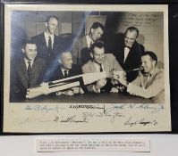 A black and white photograph of the Mercury 7, the