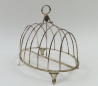 A Georgian silver toast rack with rounded dividers