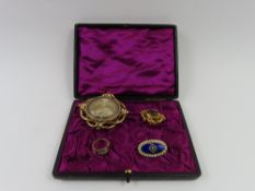 A mid-Victorian mourning brooch with hair work dec