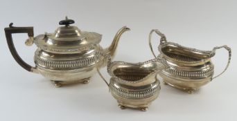 An early-20th-century three-piece silver tea set