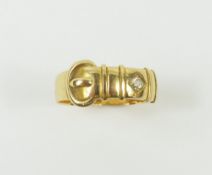 A Victorian buckle ring, set with a single old cut