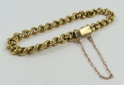 A thick figure of eight type link bracelet, each l