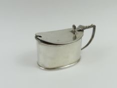 A silver mustard pot, entirely smooth in body with
