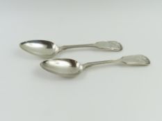 A pair of Georgian silver serving spoons with shel