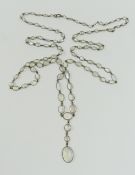A very long early 20th century moonstone necklace,