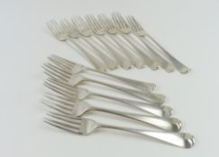 Twelve George III silver Hanoverian pattern table forks, mixed dates and makers,