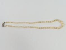 A row of early 20th century graduated pearls, poss