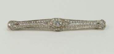 An Art Deco diamond bar brooch, with a central dia