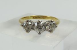 An old cut diamond three stone ring, the stones wi