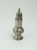 An 18th century silver caster, indistinctly marked