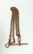 A 9ct rose gold double watch chain