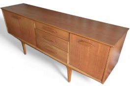 A mid-20th-century stained-teak sideboard