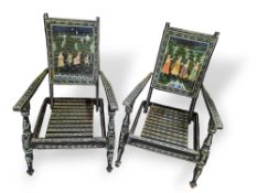A pair of reclining folding chairs