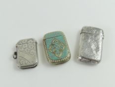 A collection of three silver vesta cases of varyin