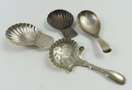 Three Georgian silver caddy spoons and one more un