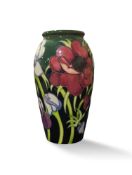A Moorcroft pottery vase, anemone pattern, 19.5cms
