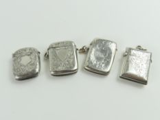 A collection of four silver vesta cases of varying