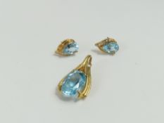 A light blue spiniel set pendant, the oval facette