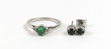 A pair of emerald single stone stud earrings, the