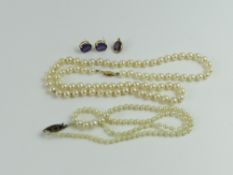 A synthetic colour change sapphire oval pendant, i