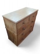 A 20th-century pine campaign chest of two short an