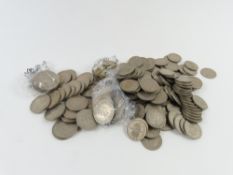A quantity of assorted coins and banknotes includi