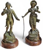 A pair of bronze 18th Century figures with green 