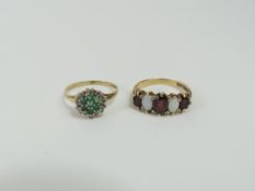 A 9ct gold garnet and white pearl five stone ring,