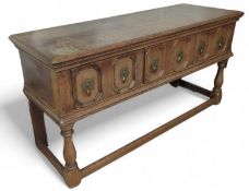 A 20th-century stained-oak sideboard