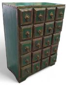 A miniature jewellery chest of 20 drawers, each wi