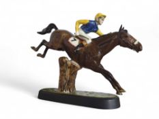 A Beswick figure of a pied jockey riding a steeple
