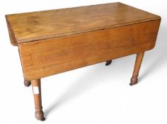 A 20th-century stained-pine drop-leaf table
