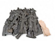A quantity of wall hanging resin castings of relig