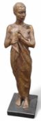 A bronze figure - girl with a towel, incised 