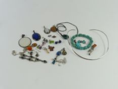A torque style necklace, marked '925', an pendant