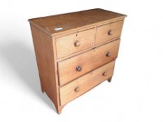 A 20th-century oak chest of drawers