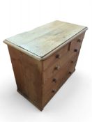 A 20th-century pine chest of two short and three l