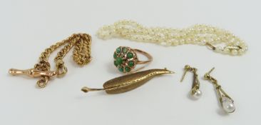 A 9ct gold cluster ring set with a green opaque st