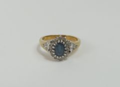 A 9ct gold sapphire and diamond cluster ring, with