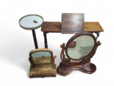 A 20th-century mahogany writing table with central