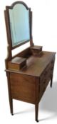 A 20th-century oak dressing table