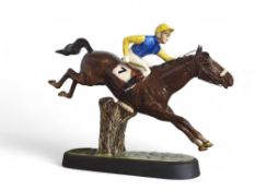 A Beswick figure of a pied jockey riding a steeple