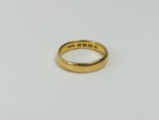 A 22ct gold plain wedding band, finger size T cent