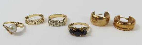 A 9ct gold garnet ring, finger size M 1/2, a 9ct g