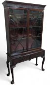 A late-Victorian stained-mahogany side cabinet