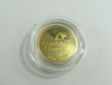 A 9ct gold Legal & General token, 7.03g gross, in