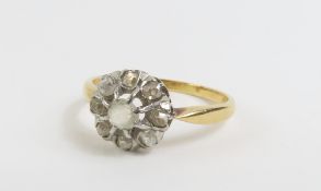 An old cut diamond cluster ring, finger size R, te