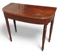 A late-Victorian stained-mahogany tea table