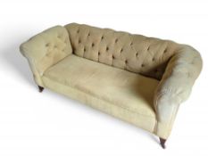 A drop-end Chesterfield sofa