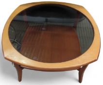 A mid-20th century style stained-oak coffee table